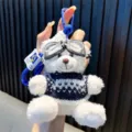 Cute plush bear keychain featuring a blue knitted sweater and aviator style goggles - White Bear - Black Sweater