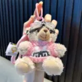 Adorable plush teddy bear keychain with a pink knit sweater and clear goggles pendant - Brown Bear - Pink Sweater