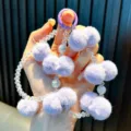 Creative beaded phone strap featuring soft purple pom-poms and sparkling crystal accents - Purple