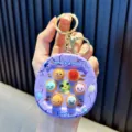 Mini llavero de juego de atrapar al topo morado con lindos botones de emoji - Púrpura