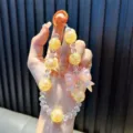 Ciondolo per telefono fatto a mano con fiocco rosa e perline arancioni lucide - 1 Pezzo/Confezione / Arancione