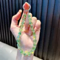 Dragonne de téléphone en perles de cristal cubiques vertes avec anneau en argent chic - Vert