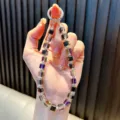 Cordon de téléphone en perles de cristal coloré avec anneau en métal argenté - Noir