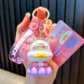 Cute pink Little Buddha duck keychain with Good Luck charm for backpacks and handbags - Purple