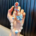 Εξαιρετικό χειροποίητο γαλάζιο μπρελόκ για το κινητό με διακοσμητικό γαλάζιο φιόγκο - Με Επίθεμα Τηλεφώνου / Μπλε