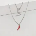 Detailed shot of silver stainless steel necklace with red enamel chili pepper pendant - 45+5cm / Red