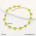 Detailed view of a gold heart anklet with green stones, showing size and weight. - Light Green