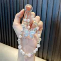 Elegant crystal butterfly beaded phone charm and car keychain with iridescent pearls - White
