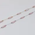 Detailed view of stainless steel bamboo joint chains with pink beads for jewelry making - Steel Color Chain / Lotus Pink