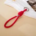 Eleganter roter geflochtener Leder-Handgelenkriemen mit silbernem Ringverschluss - Römischer Knoten Silberner Perlenanhänger (K6007) / Rot