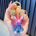 Sparkling gradient metallic rabbit keychain featuring rhinestone ears and a golden bell charm - Gradient Mirror Pink