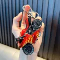 Red sports motorcycle keychain toy with flame decals, made of durable alloy material - Red