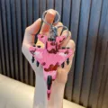 Pink camouflage alloy fighter jet keychain with F68 marking and missiles - F-68 Fighter (F68) / Pink Camouflage