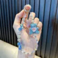 Beaded phone lanyard featuring a blue glitter bear and heart crystal charm for bags - Header Card Packaging / Blue (With Phone Patch)