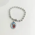 Close-up of stainless steel bead bracelet with St. Christopher religious pendant - Saint Christopher Portrait