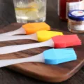 Macro view of colorful heat resistant silicone oil brushes for BBQ and professional baking - 5 Pieces / Random Color