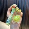 Süßer grüner Schildkröten-Schlüsselanhänger mit flüssigem Sand und Perlen - Grün