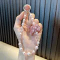 Elegant beaded phone lanyard featuring pink rhinestone bow and synthetic pearls variant - 1 Piece/Pack (With Gasket) / Pink