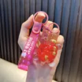 Süßer rosa glitzernder ölgefüllter Schildkröten-Schlüsselanhänger mit Band - Fuchsia
