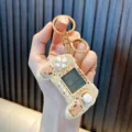 Portable mini gamepad keychain featuring a cute Capybara design in cream white finish - Study / Beige