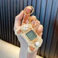Mini Tetris game console keychain with cute Capybara theme in beige color - Orange / Beige