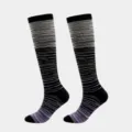 Close-up of black compression socks with purple gradient striped pattern and reinforced toe. - S/M / Light Gray And Light Purple