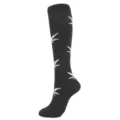 Side view detail of black compression knee-high socks with stylish white leaf pattern - Black White Leaf