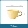 Yellow Nordic ceramic coffee mug with gold handle and flower petal rim design - 14x11x8cm / Yellow