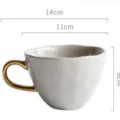 Nordic style white ceramic coffee mug featuring hammered texture and a gold handle - 14x11x8cm / Gray