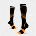 Chaussettes de compression professionnelles noires avec rayures orange sportives - Orange