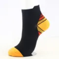 Professionele zwarte sport compressiesokken met oranje en gele hiel details voor renners - Oranje Patroon
