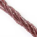Detail view of rhombic purple crystal beads faceted bicone spacers for DIY jewelry crafts - 115 Pieces/Pack / Medium Purple