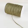 High-quality close-up of gold metallic glitter ribbon on a white plastic spool - 4mm 20 Yards Pack / Dark Green