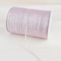 Close-up detail of glittery pink metallic ribbon roll for DIY jewelry and hair accessories - 4mm 20 Yards Pack / Pink