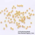 Cuentas de crimpado de 2,0 mm bañadas en oro con apertura de 1 mm para joyas DIY - Cuentas de Chafa 2.0mm / 100 Piezas/Paquete / Chapado en oro 14K