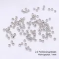 Cuentas de presión de metal plateado de 2,0 mm para joyería DIY, agujero 1 mm. - Cuentas de Chafa 2.0mm / 100 Piezas/Paquete / Chapado en Oro Blanco