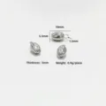 Macro view showing 10mm dimensions of a silver stainless steel lotus seedpod charm - Lotus Bud / 10x5.5x5mm / Gold