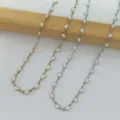Collana minimalista in acciaio inossidabile con cuore smaltato in oro e argento - Oro / Bianco