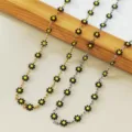 Dettaglio di collane a margherita in acciaio inossidabile in oro e argento, trendy - Nero (Colore Argento)