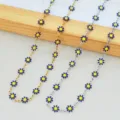 Close-up of stainless steel daisy chain necklaces with blue and yellow enamel flowers - Blue (Steel Color)