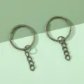 Antique brass metal keyring with a 4-link chain for DIY jewelry making accessories - 2.5cm Embossed Keyring With Ring / 10 Pieces/Pack / Antique Bronze