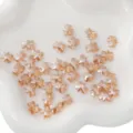 Perle di vetro sfaccettate a forma di orso oro champagne per la creazione di gioielli fai-da-te - 10 Pezzi/Confezione (8x10mm) / Arancione