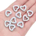 Perles d'espacement en céramique bleu clair en forme de cœur pour bijoux DIY - Style Cœur Vidé (15x13mm)