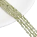 High-quality faceted pale green round synthetic zircon beads for DIY jewelry making - Olive Green