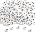 Detailed view of white round acrylic beads with black letters, including the word HAPPY. - 26 Letters Random Mix / 100 Pieces/Pack (4x7mm) / White Base Black Font