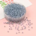 Cuentas de vidrio azul claro con núcleo plateado en contenedor redondo para joyería DIY - Plata Azul Cielo