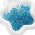 Perles de rocaille en verre bleu aqua de 4mm avec centre argenté pour bijoux DIY - Indigo