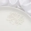 High-quality silver triangular spacer beads for handmade DIY jewelry making on white plate - 3.5mm Center Hole Triangle / 10 Pieces Pack / Thick Silver