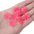 Small 20mm translucent pink frosted acrylic six-petal flower beads held in palm - 50 Pieces/Pack / Rose Red