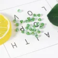 Transparent 4mm green faceted bicone crystal beads for DIY handmade jewelry and craft projects - Grass Green AB